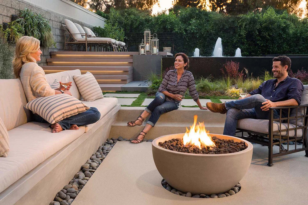 Family enjoying gas fire pit in backyard